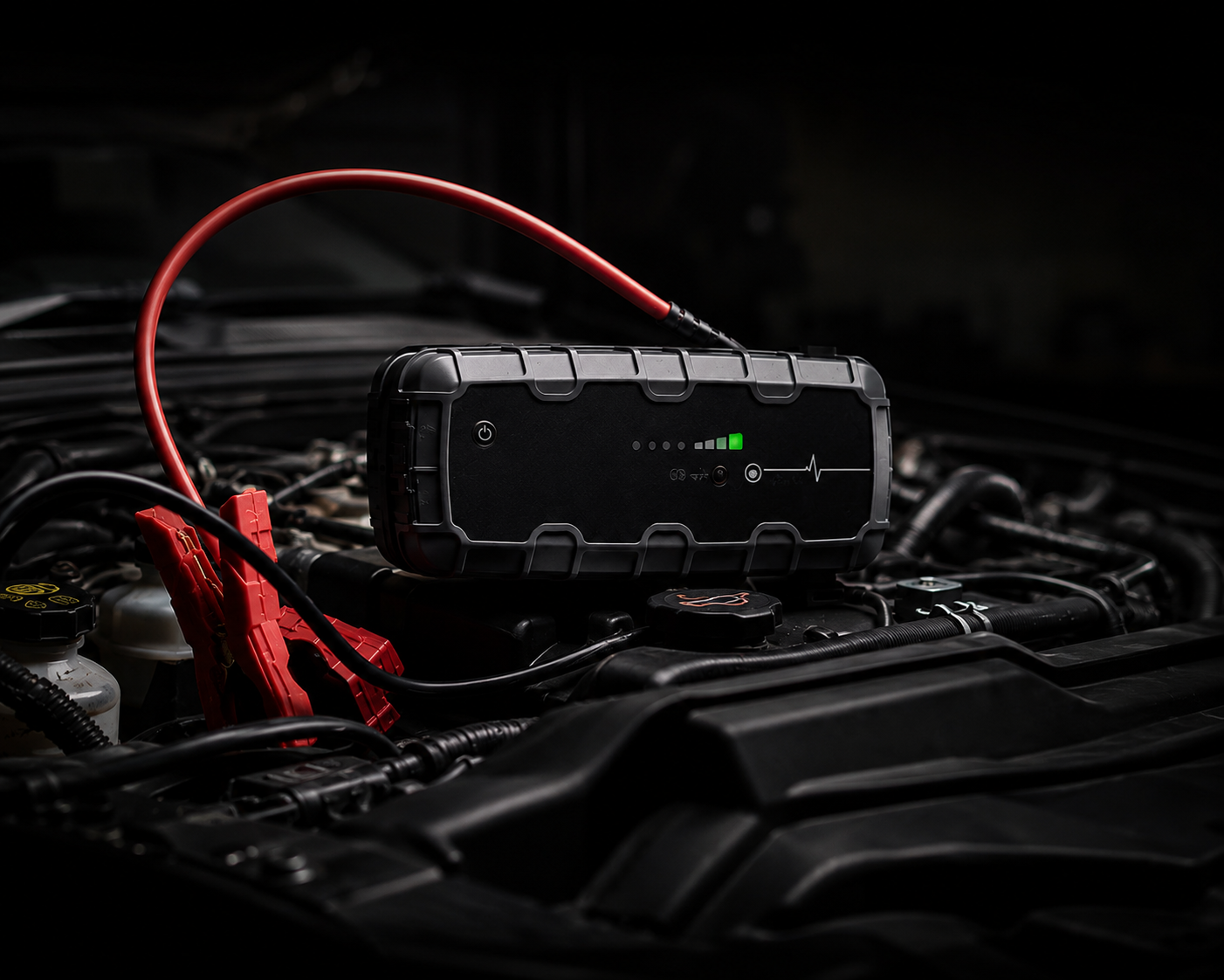 Portable jump-start pack connected to a vehicle battery